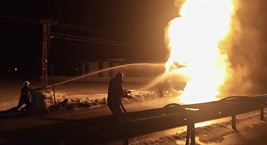 Alevlerin arasında kalan yaralı oğlu için canını hiçe saydı
