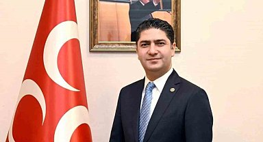 MHP'li Özdemir'den gazetecilere yeşil pasaport teklifi