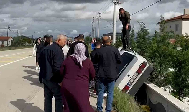 Arabanın üzerine çıktı, hem yaralıları izledi hem sağlık ekiplerini aradı